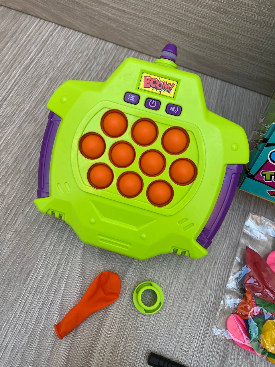 Consola Pop It “Quick Burst” con Inflador de Globos
